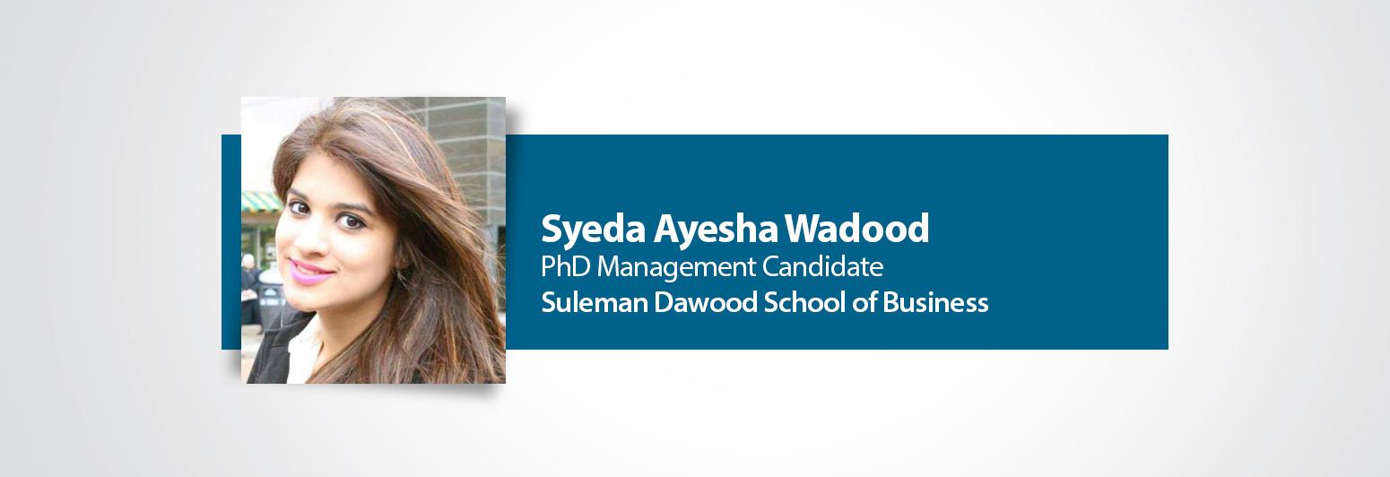 Picture of Syeda Ayesha Wadood and name in white text over blue background